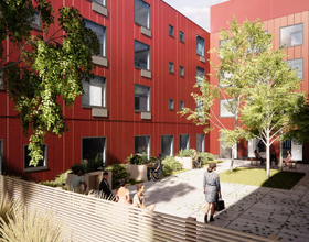 Bold red and timber design for new affordable housing 