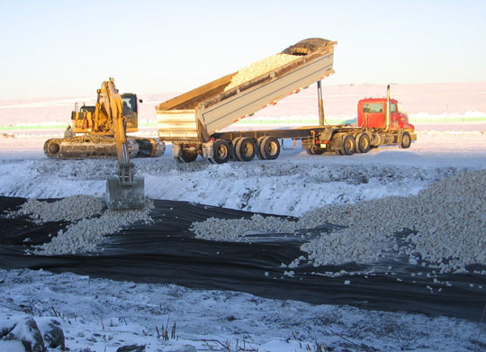 Approximately 21 million m3 (741 million cf) of earth was excavated from the floodway channel during construction.