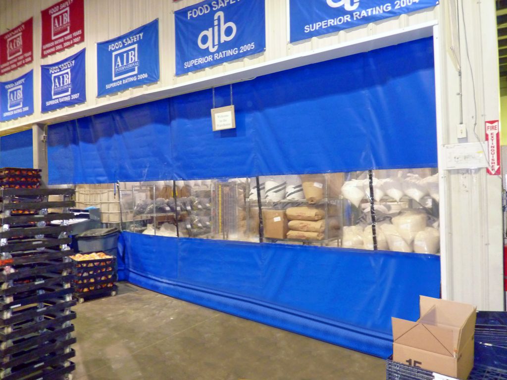 Fabric curtain walls improve both indoor air quality (IAQ) and worker productivity by blocking out potential health hazards like dust and fumes.