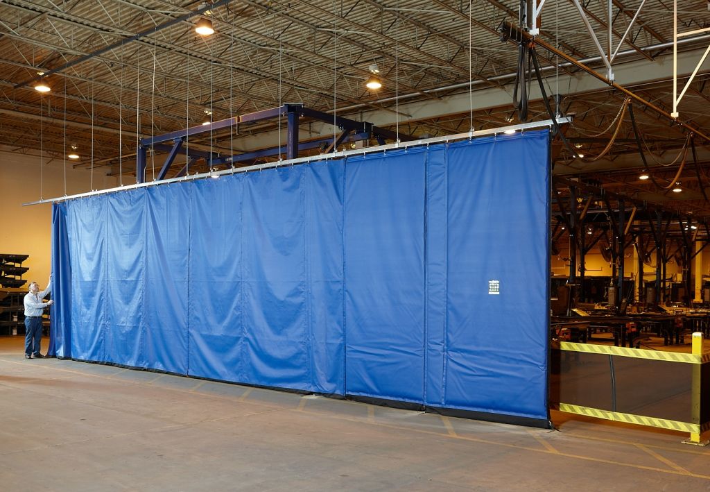 Flexible fabric curtain walls are specifi ed for industrial projects and plant operations because they can help manage physical space, while also safeguarding again environmental conditions like wind or sound.