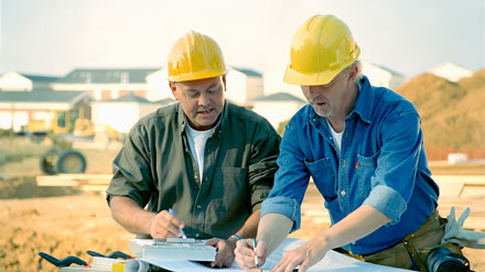 bigstock-Contractors-Talking-4542608