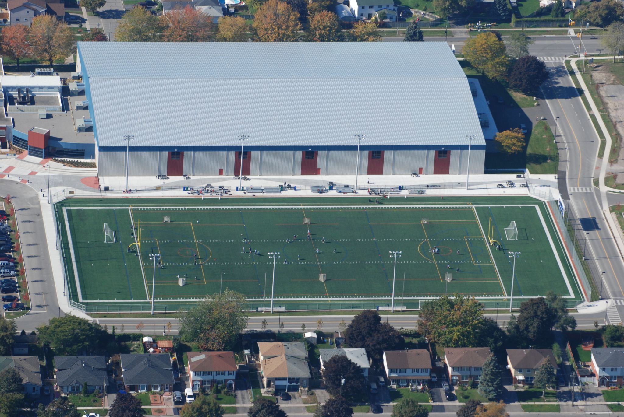 The 120,773-m2 (1.3 million-sf) City of Oshawa Civic Complex and Fieldhouse, renovated and expanded in 2011, has a standing-seam roof system and includes an indoor fieldhouse, swimming pool, five outdoor fields, and multiple indoor courts. 