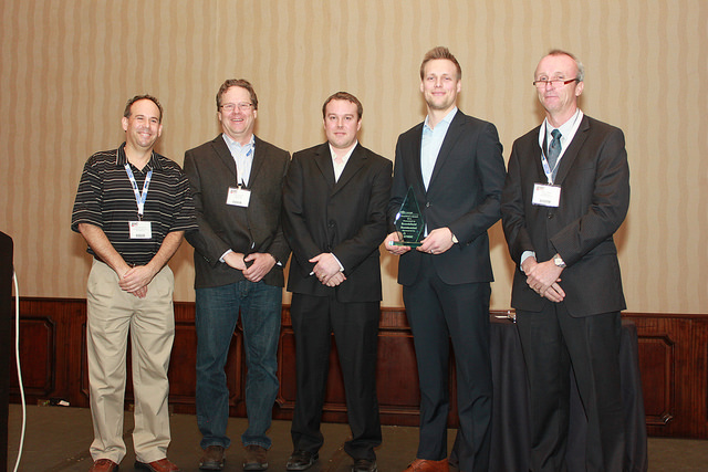 At last year’s event, Paul Duffy of Icynene (right) presented the 2014 Canadian Residential Energy Services Network (CRESNET) President’s Award to Brookfield Residential’s (from left to right) Rod Buchalter, John Godden, William Greig, and Bob Stewart. Photo © Randy Martin