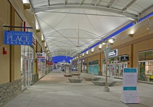 Polytetrafluoroethylene (PTFE) fibreglass membrane walkway canopies protect shoppers from any type of weather.