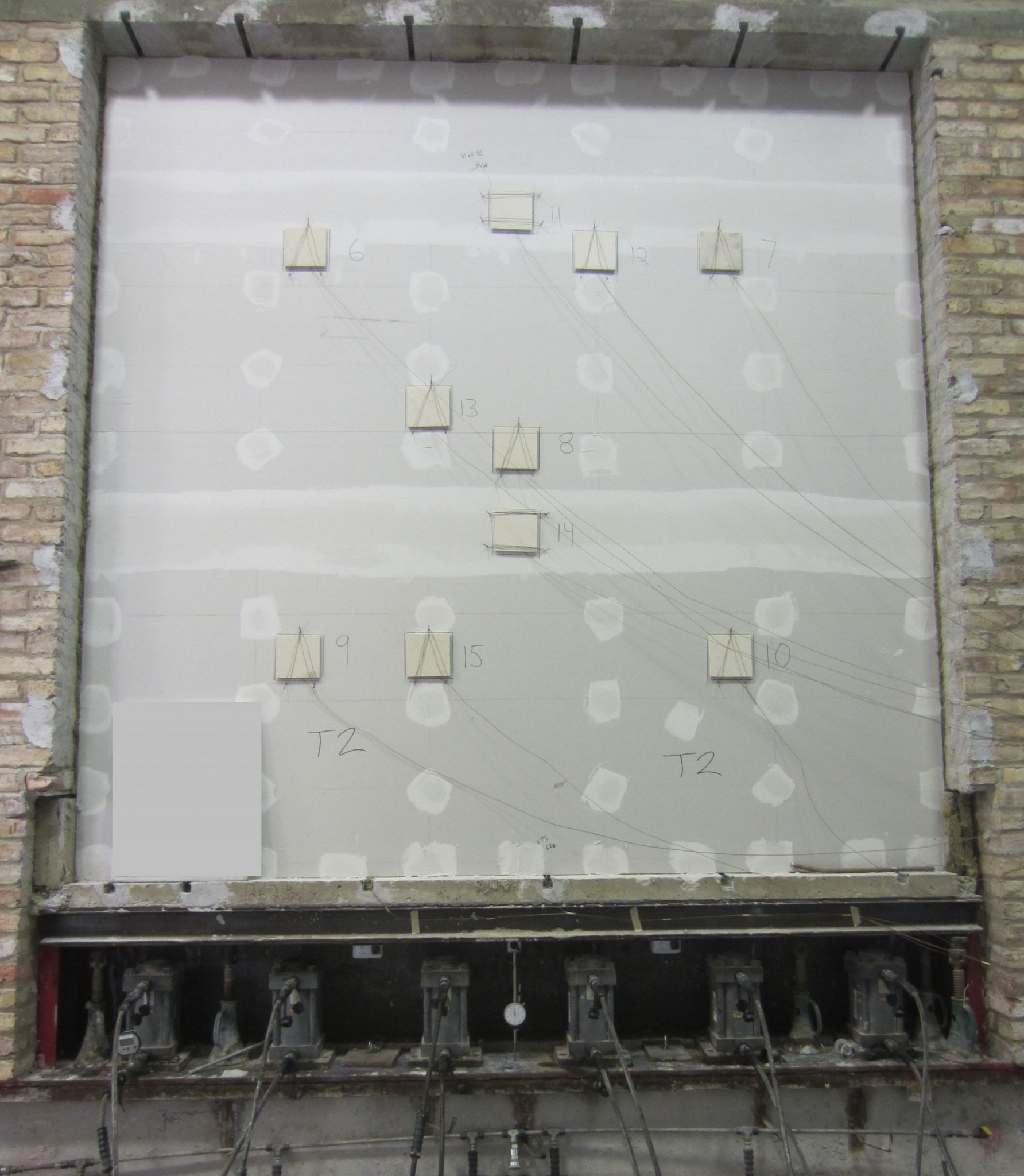 This shows a fi re test of a gypsum wall. Taped joints and fastener heads are included. Photo courtesy Underwriters Laboratories