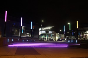 Linear perforated metal lighting and ‘candlesticks’ illuminate steps of walkways at the east and south-east entrances.