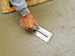 bigstock-Close-up-of-hand-using-trowel--30407555