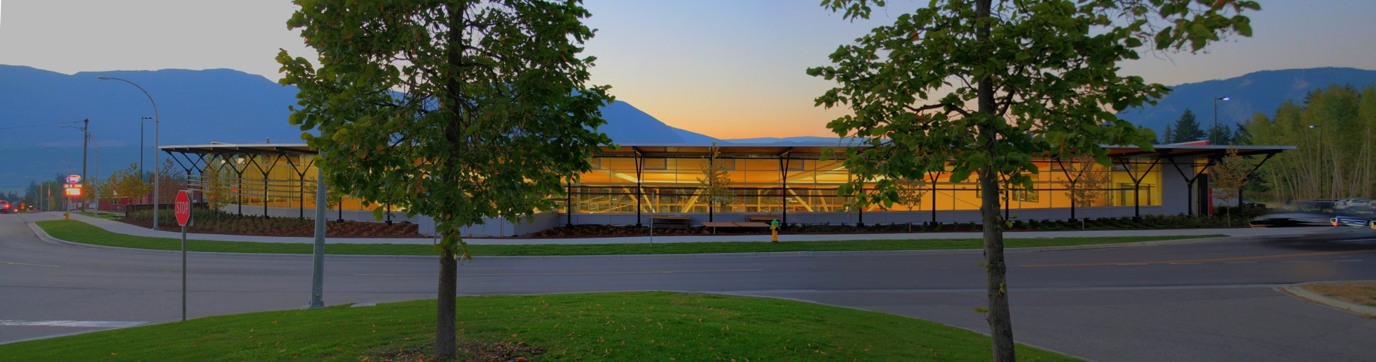 The fully glazed street wall follows the curve of 11th Avenue. The store’s ancillary functions are under the landscaped boulevard. 