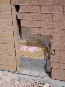 For the barracks, inspections revealed the flashing failed in numerous locations, particularly at transitions. The result was moisture could move laterally, necessitating replacement work.