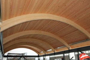 An example of heavy timber construction, using Douglas fir timber decking on top of curved glued-laminated (glulam) units.