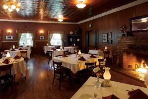 Decorative styrene ceiling panels evoke the look of metal in a high-end restaurant.