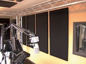 This radio station studio required a high proportion of absorptive treatment, using surface area on the walls and ceiling.