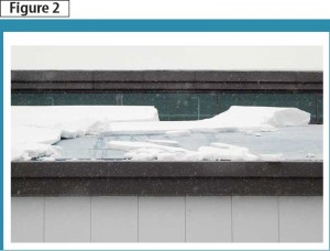 Example of a sliding snow mass on a slippery roof that will fall to the ground below. Photos courtesy Northern Microclimate Inc.