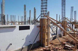 Bracing is applied to the ICF columns as the wall height is increased during construction.