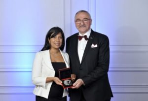 Kathy Baig, FEC, president of the Ordre des ingénieurs du Québec presents the 2018 Grand Prix d’excellence award to Roland Charneux, P.Eng., LEED AP BD+C, director at Pageau Morel. Photo courtesy Pageau Morel