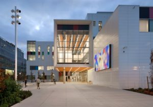 Recessed slotlights in soffits provide strong illumination at building entries and align with interior slotlights at Emily Carr University of Arts and Design in Vancouver. The project has won the 2018 Vision Award from the Illuminating Engineering Society of British Columbia. Photo © Silent Sama