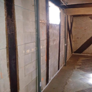 Bowed walls can pose serious structural damage and safety issues. A carbon fibre wall supports ties to the foundation base and the house framing. Photos courtesy Rhino Carbon Fiber