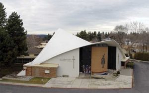 The reroofing of the St. Charles Parish and School in Spokane, Washington, with a reinforced, 1.5-mm (60-mil) TPO membrane preserves an important era in the evolution of modern architecture, featuring an irregularly shaped roof. Photo courtesy St. Charles Parish & School