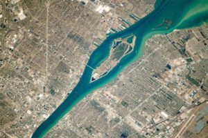 Decisions about urban environments have long-term implications. Shown is Belle Isle in the Detroit River, taken by a member of the International Space Station crew on April 12, 2018. Photo courtesy NASA