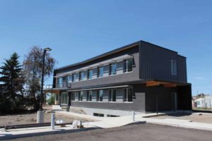 Prefinished metal siding on south and east elevations.