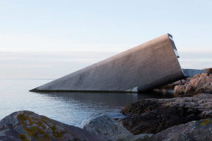 Half-sunken into the sea, ‘Under’, restaurant by Snøhetta, breaks the surface of the water to rest directly on the seabed 5 m (14 ft) below. Photo © Inger Marie Grini/Bo Bedre Norge