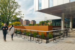 Cafe-style bar seating was introduced in the east entrance plaza of the new student centre with shaded areas for laptop users to take shelter from the sun’s glare.