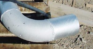 Example of increased thickness in the weld area that may not meet the requirement of architecturally exposed structural steel (AESS) and require additional blending.