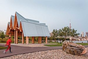 Approximately 600 m2 (6458 sf) of proprietary blue-grey zinc, double-lock standing seam panels clad the four sections of the steep roof of the open-air pavilion at the Trillium Park and William G. Davis Trail at Ontario Place in Toronto. Photo © Gvan Riel