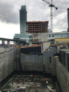 The first lift of waterproofing is being installed at the site of the third tower in the Brentwood Town Centre complex, Burnaby, British Columbia.