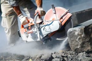 Flagged by the Canadian Centre for Occupational Health and Services (CCOHS) and the Occupational Safety and Health Administration (OSHA) as a known carcinogen, silica dust is released during the cutting of natural, panelized, and manufactured stone panels. Photo © Shutterstock