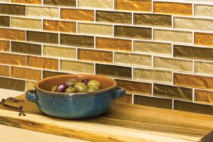 Glass tiles are easy to clean and are impervious to water and stain.