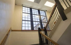 Fire-protective glass in stairwells aids in preventing the spread of flames and smoke from one section of this elementary school to another by creating an effective compartmentation. Photo © Essential Images Photography