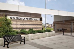 A panelized stone panel in terrazzo colour at the New Brighton Athletic Park in Calgary, Alta., features an integrated drainage channel acting as a rainscreen and keeping the wall dry. It eliminates the need for the substrate to be attached to z-bar or drainage mats, but still has the reduced thickness and esthetics of a thin stone veneer and can be applied directly over rigid insulation.