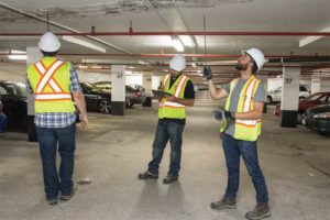 Figure 3: Suspended slab soffit acoustical sounding evaluation in progress.