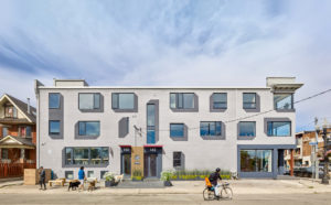 The street view of the revitalized building that serves as a creative mixed-use hub, also serving as Dubbeldam Architecture + Design’s studio.