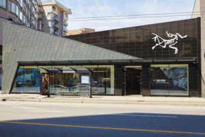 Arc’teryx flagship store in Vancouver draws inspiration from nearby mountains with a custom-fabricated angular facade using climate-resilient Type 2 special high-grade (SHG) zinc.