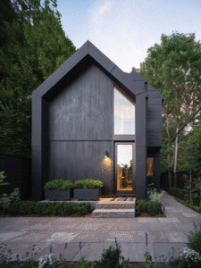 This 140-year-old Ontario carriage house uses resilient special high-grade (SHG) zinc cladding that wraps the walls, columns, and roof.