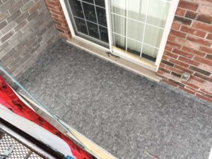 Figure 2 Sheet vinyl waterproofing installation.