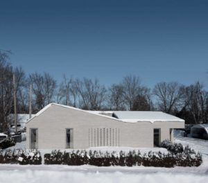 MI-2, the central piece of a triptych of family homes nestled along the Mille-Îles River in Laval, Que., stands out with its distinctive design.