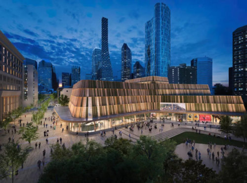 Rendering of a modern building with curved wooden facade lit up at dusk, people gathering in the plaza, skyscrapers in the background.