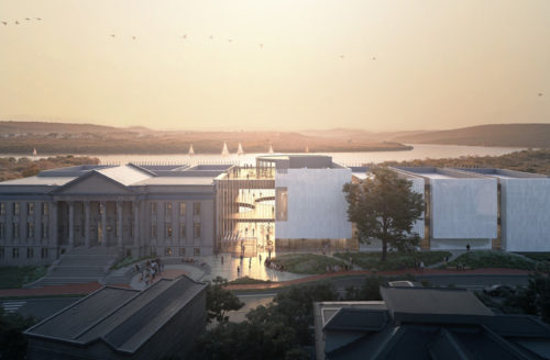 Sunset view over a cultural complex with classical and modern architecture.