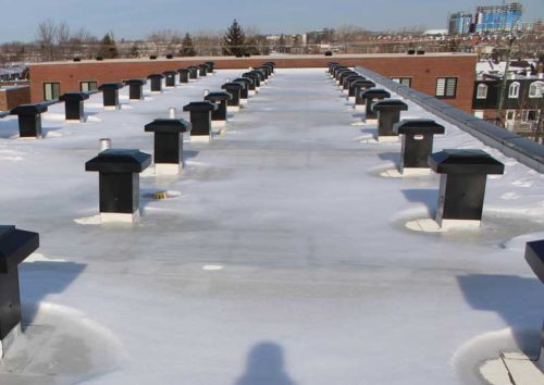 roof ventilators on a snow-clad roof