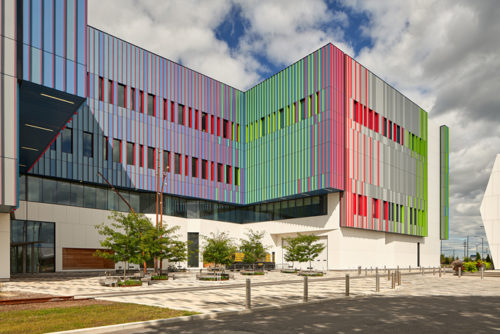 exterior of a low-rise building with a colorful facade