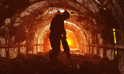 Silhouette of a worker in a mine