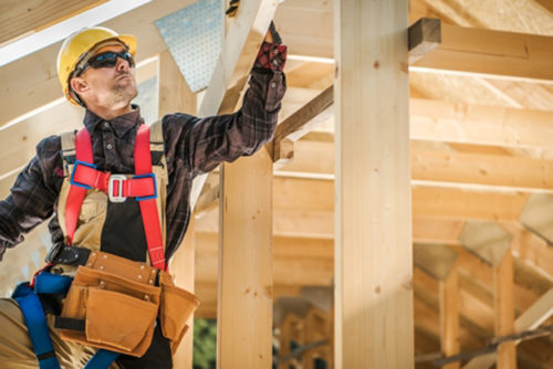 construction worker working on wood