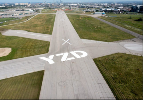 barren airport runway with YZD written on it