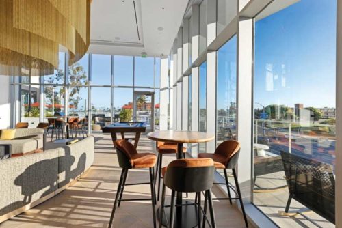 empty restaurant dining area near French windows