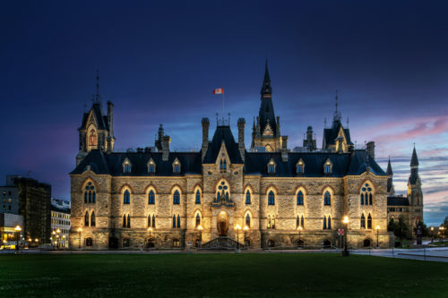 illuminated Gothic-style building